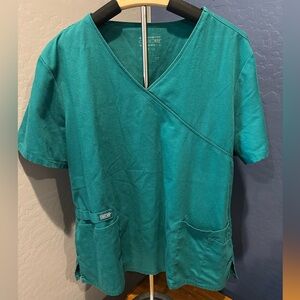 Dark green scrub top teal
